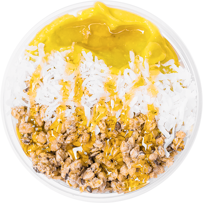 Smoothie bowl with honey, granola, and coconut toppings. 